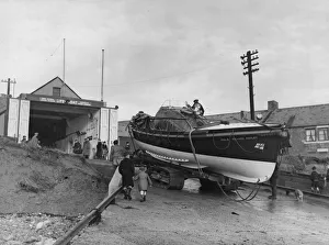 The Newbiggin lifeboat Richard Ashley being towed back into the Lifeboat House after