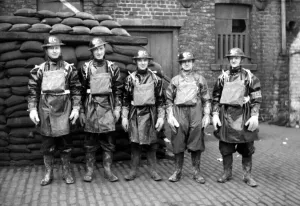 Newcastle Chronicle and Journal staff wearing gas masks as part of air raid precautions
