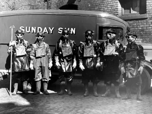 00422 Prints: Newcastle Chronicle and Journal staff wearing gas masks as part of air raid precautions