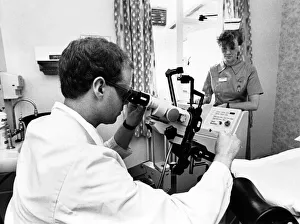 01194 Prints: Newcastle General Hospital. Medical Physics Technician Philip Oliver checks a Coherent XA
