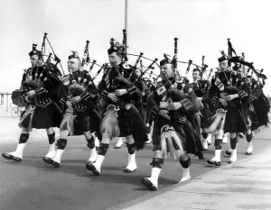 Bagpipes Prints: The Newcastle Pipe Band march along the seafront during a contest organised by North-East