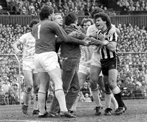 Arguing Prints: Newcastle skipper Kevin Keegan angered by a spectator who ran on the pitch