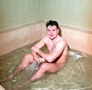 One Man Only Prints: Newcastle United footballer Paul Gascoigne in the bath naked in the dressing rooms at St