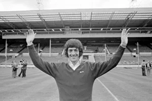 Newcastle United footballer Terry Hibbitt gives the Geordie goal salute as he stands