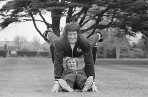 Newcastle United goalkeeper Ian McFaul (on floor) gives midfield star Terry Hibbitt a