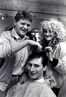 Hairdresser Prints: Newcastle United player Glenn Roeder pictured receiving a hair cut from team mate Paul