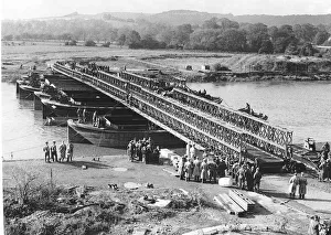 Newly invented Bailey Bridge built in Britain and the USA is demonstrated across a