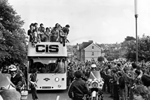 Team Prints: Newport County football team ride through the crowd-lined streets of the town to