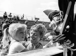 Puppets Prints: Nice to see you, says Mr Punch to little Jacqueline McGrath of Redcar at British