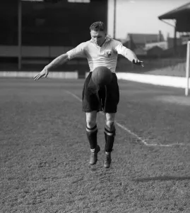 Skill Prints: Bill Nicholson of Tottenham Hotspur practices his ball control during a team training