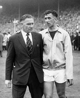 00253 Prints: Bill Nicholson walks off the pitch with Burnley Captain Jimmy Adamson after Tottenham