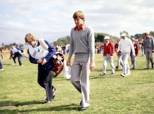 00013 Prints: Nick Faldo with his caddy in the background his partner Peter Oosterhuis of the European