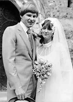 Marriage Prints: Nick Faldo Golf and Melanie Rockall stand outside the church after their wedding in St