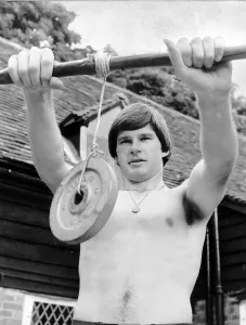 Golfer Prints: Nick Faldo Golf stands bare chested as he exercises his wrists by holding a weight