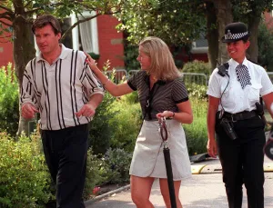 Nick Faldo Golfer with his girlfriend Brenna Cepelak by the clubhouse after his second