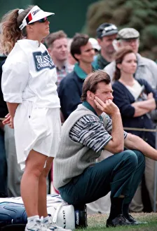 Caddie Prints: Nick Faldo sits down on his golf bag during his 74 in the first round of the British Open