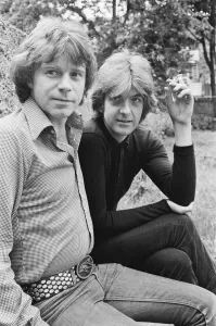 Nick Lowe dark shirt) and Dave Edmunds (in lighter shirt) pictured together in 1979