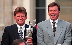 Nick Price holding British Open Golf championship trophy alongside Nick Faldo at St