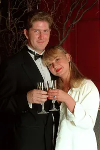 Nicola Duffett Actress with fiance Ian Henderson drinking champagne