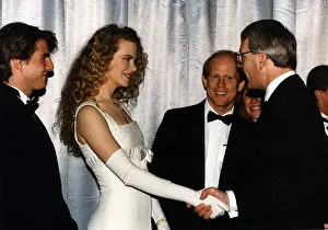 00028 Prints: Nicole Kidman actress shakes hands with Prime Minister John Major at film premier of Far