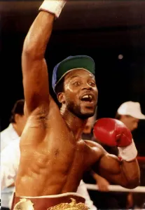 Nigel Benn boxer celebrates after beating Iran Barkley to retain his middleweight