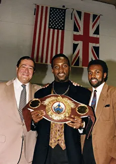 Nigel Benn Boxer with Manager Ambrose Mendy and American Promoter Bob Arun