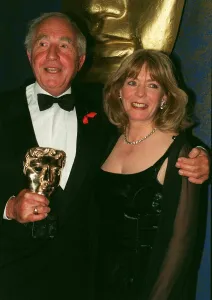 Nigel Hawthorne actor with actress Alison Steadman at Bafta Awards at the Royal Albert