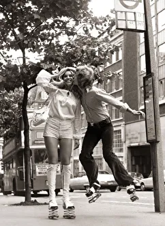 Nigel Lythgoe pictured in 1971 kissing a girl - Heather Berkers - with springs on his