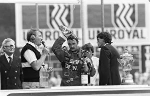 01428 Prints: NIGEL MANSELL CELEBRATING A GRAND PRIX WIN AT BRANDS HATCH 13 / 07 / 1986