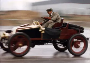 00152 Prints: Nigel Mansell Formula One racing driver races in 1902 Renault. July 1992