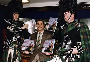 00197 Prints: Nigel Mansell Motor Racing Driver Formula One F1 at Harrods for the signing of his book