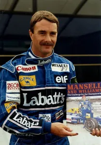 Nigel Mansell Motor Racing Grand Prix Formula One Driver holding a copy of his magazine