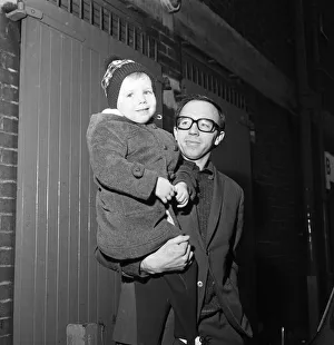 01096 Prints: Nobby Stiles, the Manchester United half back leaves Old Trafford with his 3-year-old son