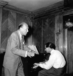 Noel Coward actor and playwright performing at the Dorchester Hotel London July