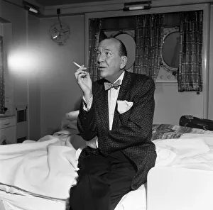Noel Coward arrives at Southampton onboard the Queen Elizabeth. 4th June 1957