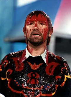 Noel Edmonds TV Presenter is slimed as part of the resolution of his roadshow