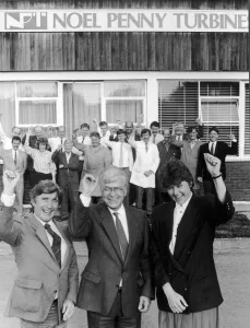 Volvo Prints: Noel Penny, owner and Chairman of Noel Penny Turbines celebrates as he signs a joint