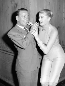 Norman Wisdom actor May 1956 Anita Ekberg actress at the Savoy Hotel