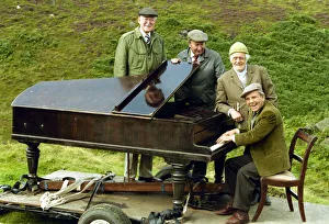 Norman Wisdom in his role as Billy Ingleton the piano player in the BBC situation comedy