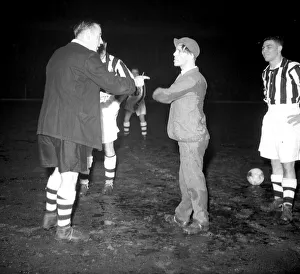 Norman Wisdom seen here being spoken to by the referee during a Boxers v Jockey charity