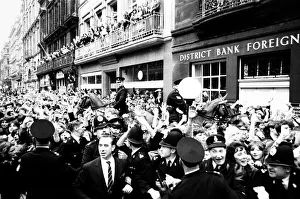 00396 Prints: Northern Premier of A Hard Days Night'. Fans line up along the streets in
