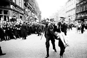 00396 Prints: Northern Premier of A Hard Days Night'. Fans line up along the streets in