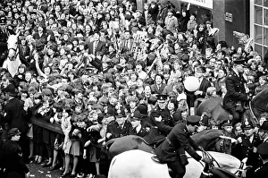 00396 Prints: Northern Premier of A Hard Days Night'. Fans line up along the streets in