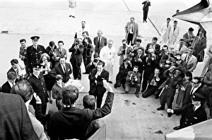 00396 Prints: Northern Premier of A Hard Days Night'. Fans line up along the streets in