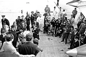 00396 Prints: Northern Premier of A Hard Days Night'. Fans line up along the streets in