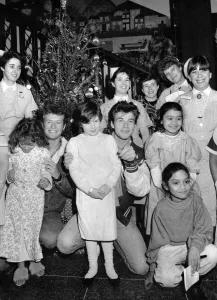 Norwegian pop group A-ha present a Christmas tree to Queen Elizabeth Hospital