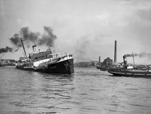 Norwegian Timber Ship being towed up the Thames by a Dutch Tug boat after a gale in
