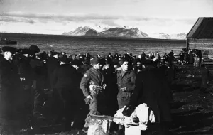 01461 Prints: Norwegians waiting to be evacuated from the Svalbard Islands late one evening during