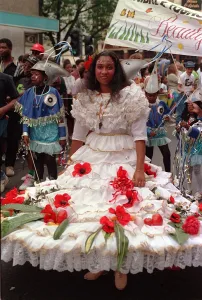 Customs And Prints: Notting Hill Carnival 1991 Men and women dress up in costumes during
