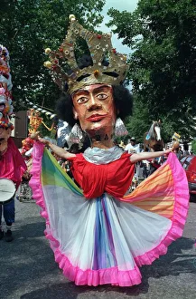 Notting Hill Carnival August 1991 Men and women dress up in costumes during